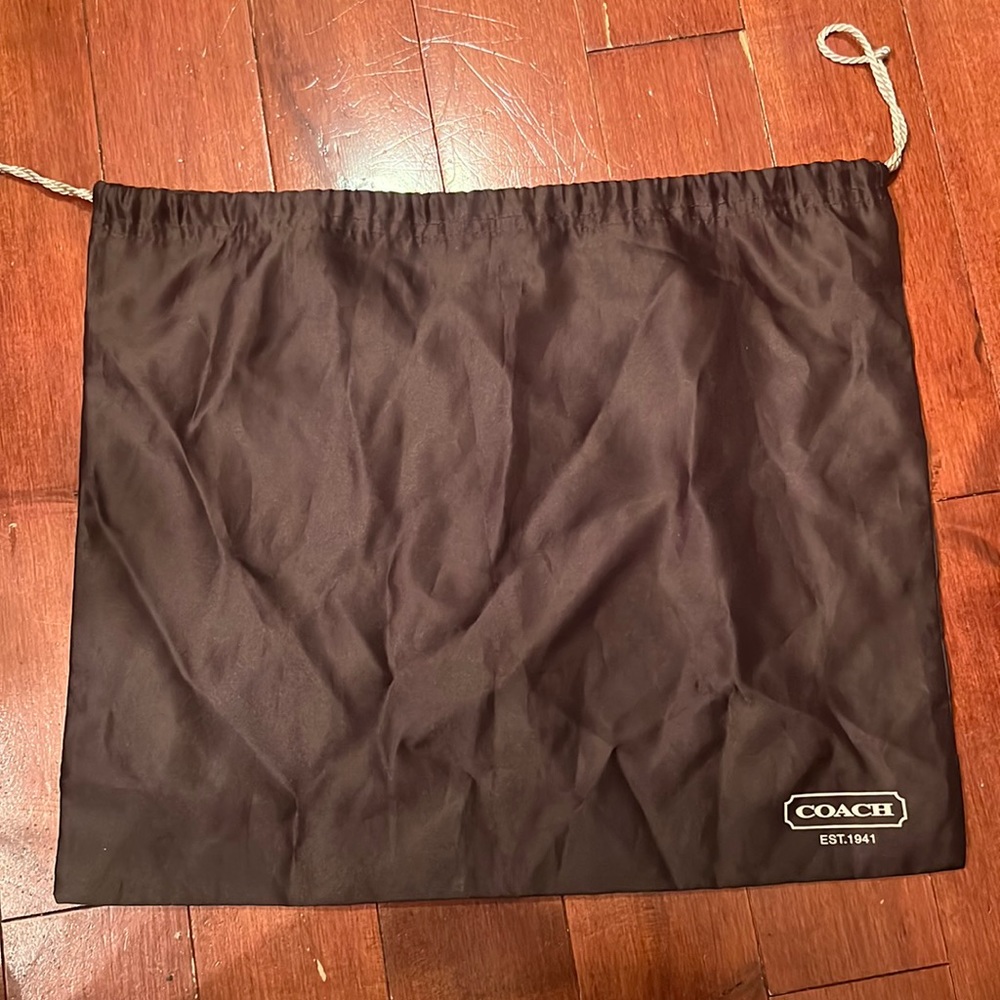 Brown coach dustbag like new never used
